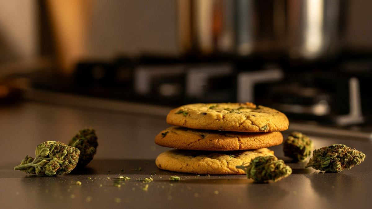 a pile of nine realms edible cannabis cookies on a kitchen counter