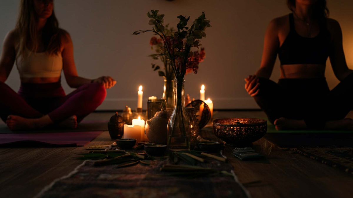 two women meditating in a nine realms yoga retreat
