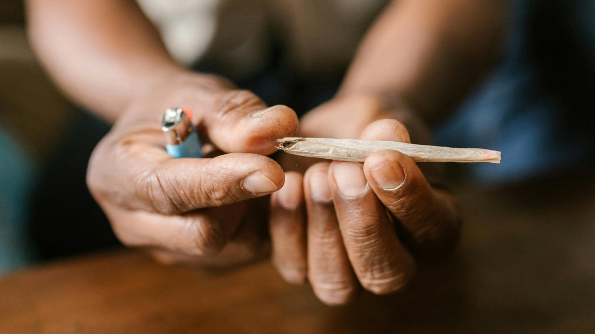 Woman Smoking Nine Realms Pre-Roll for Multiple Sclerosis