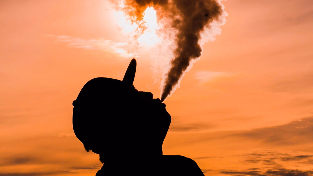 Man Vaping Nine Realms Product 10-OH-HHC