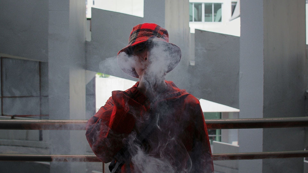 Man smoking Nine Realms