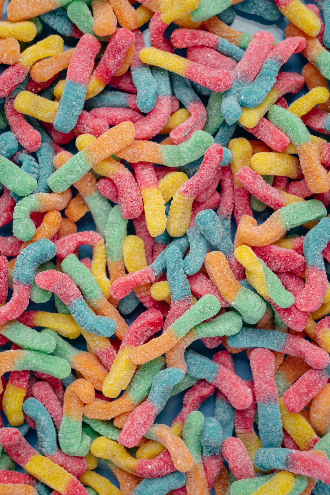 A pile of Nine Realms HHC Gummy Worms