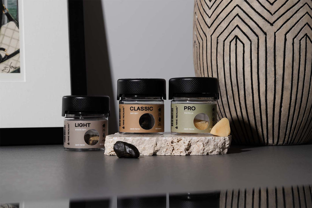 Static, Dry Sift, and Piatella Hash from Nine Realms with T9HC on a grey table