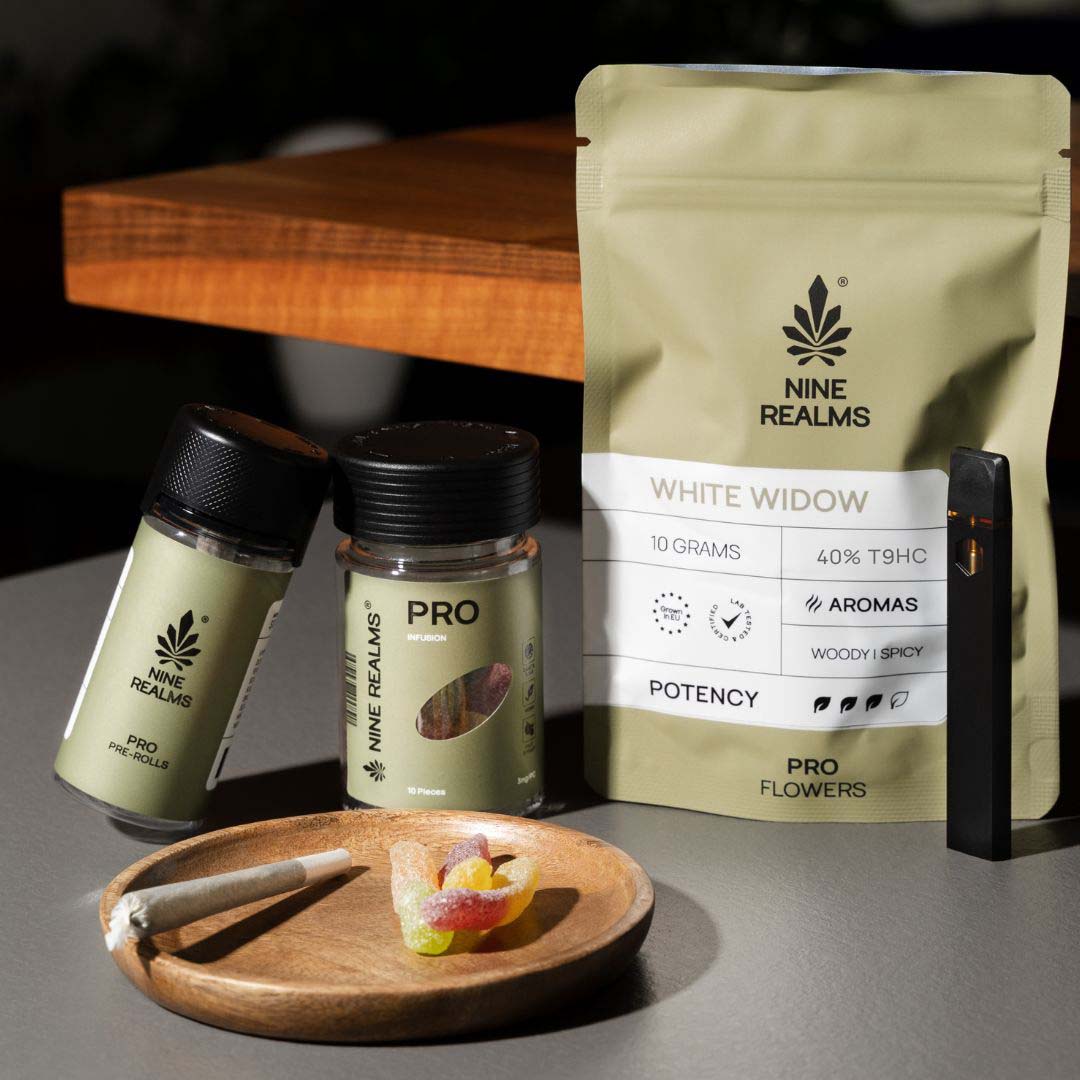 nine realms cannabis products sitting on a desk